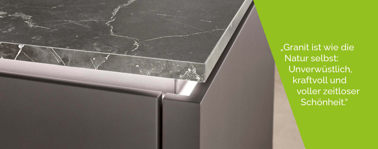 Detailaufnahme einer hochwertigen Granit Arbeitsplatte in moderner Küche